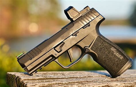 P322 Mr Gunsngear Reviews The New Sig Sauer 22 Pistol